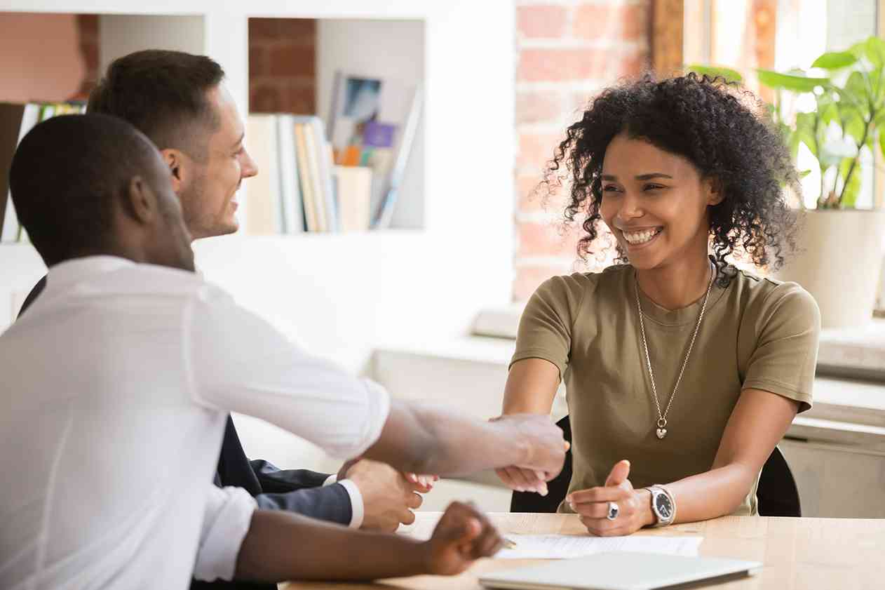 Business professionals shaking hands.